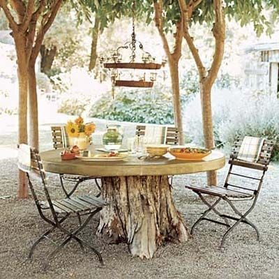 2-میز عصرانه خوری: از تنه درخت به عنوان پایه میز عصرانه‌تان استفاده کنید